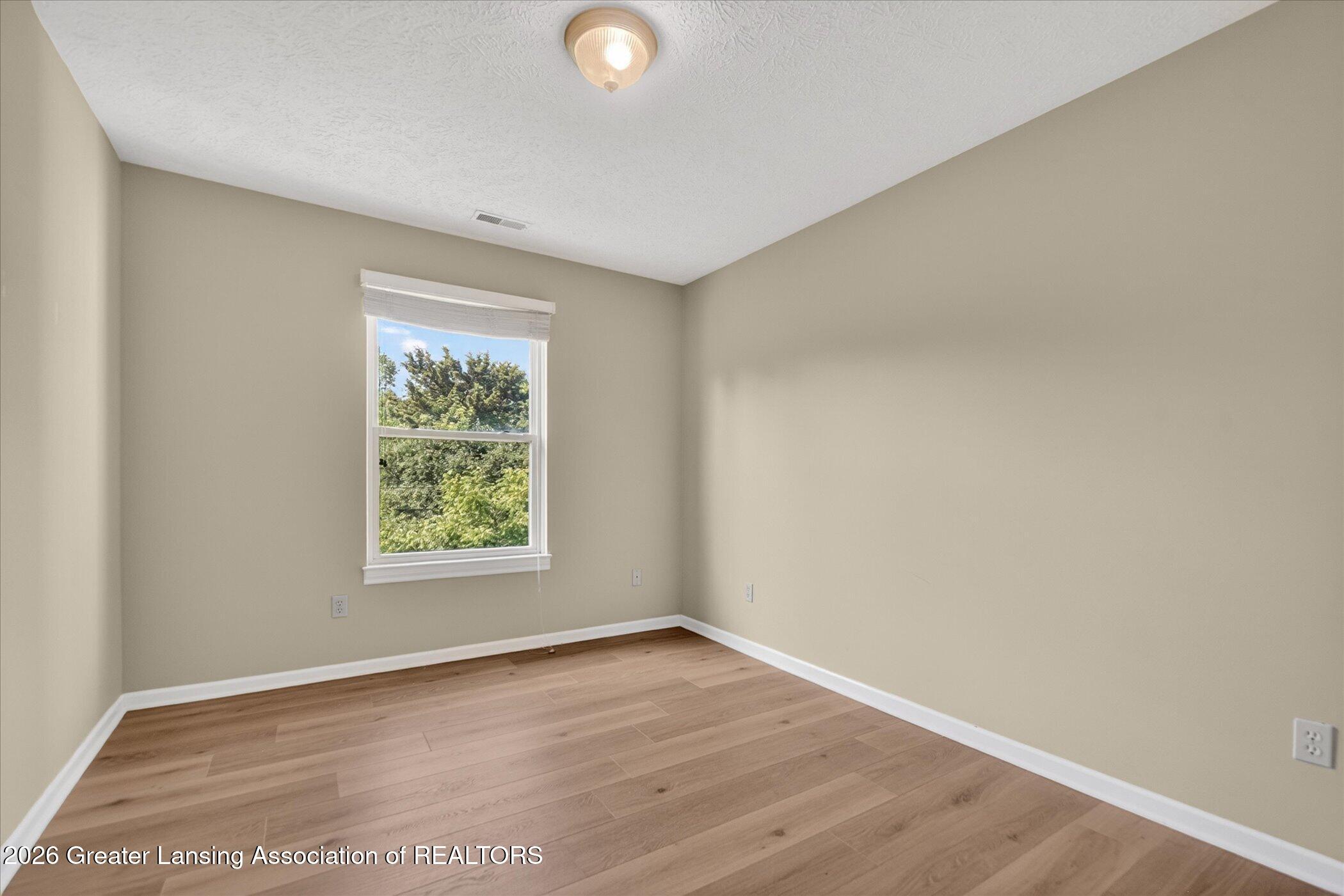 1337 Coolidge Road, Unit 16 East Lansing, MI 48823 - Photo 17 of 31 17-1337-Coolidge-Rd-WindowStill