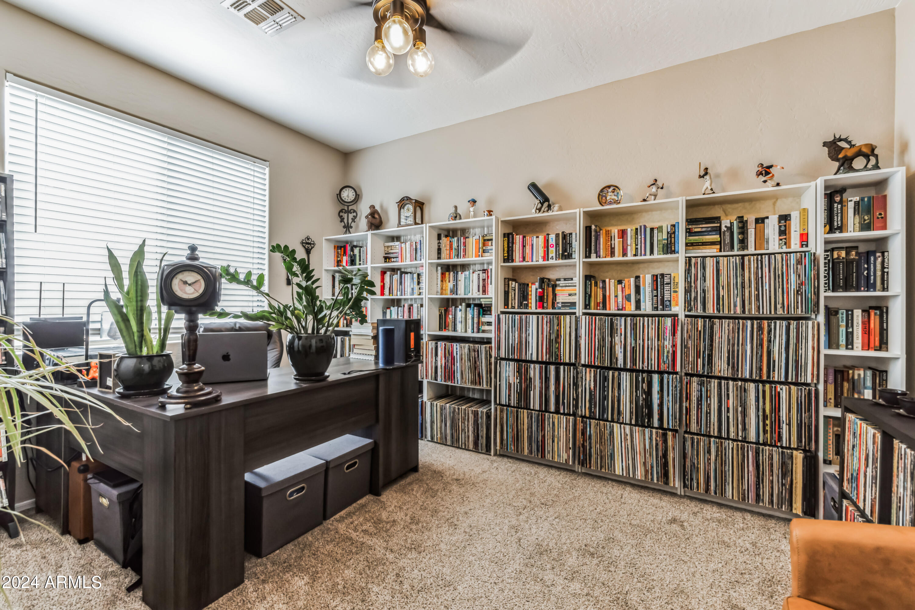 2535 South Martingale Road Gilbert, AZ 85295 - Photo 17 of 25 a view of a workspace with furniture