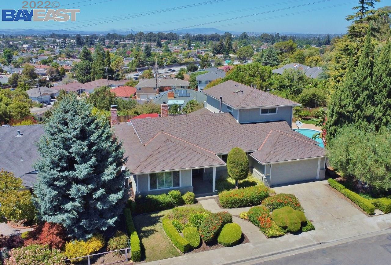 2057 Hillside Circle San Leandro, CA 94577 - Photo 1 of 1 an aerial view of a house with a garden