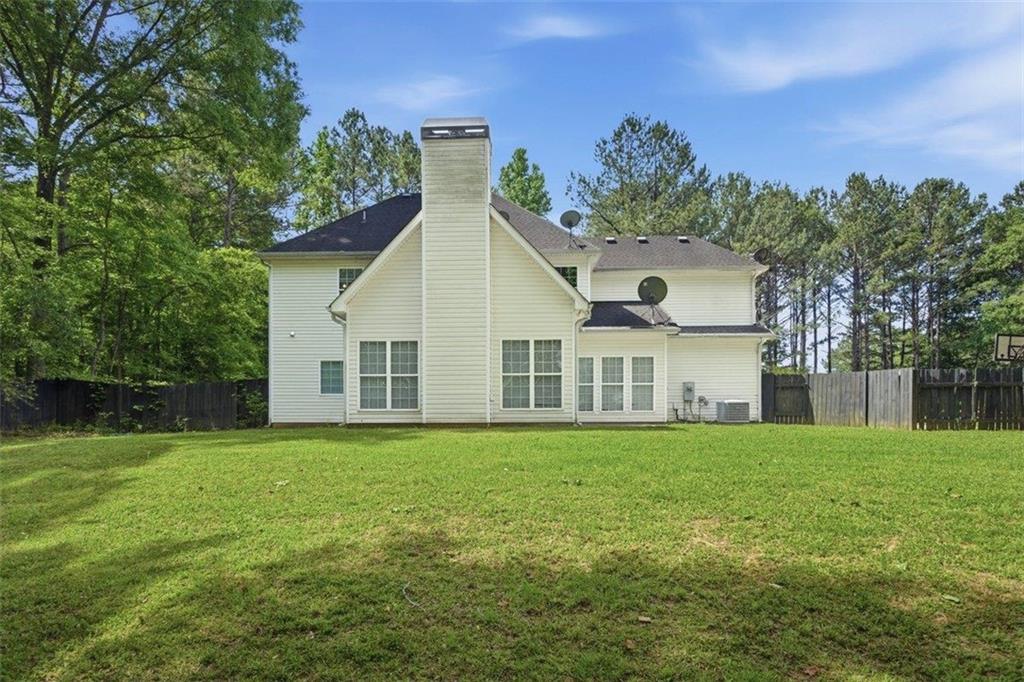 1231 Hillview Road Hampton, GA 30228 - Photo 38 of 49 a view of a house with a yard