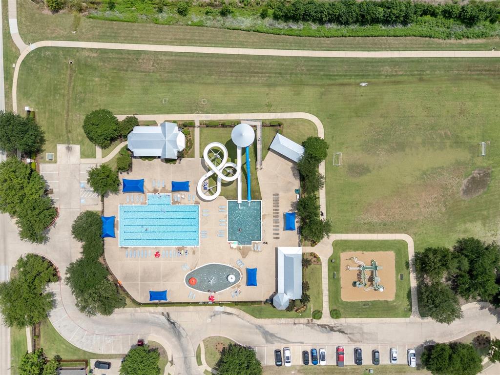 709 Paint Creek Road Murphy, TX 75094 - Photo 22 of 27 Fabulous Pool, slides and Playground!