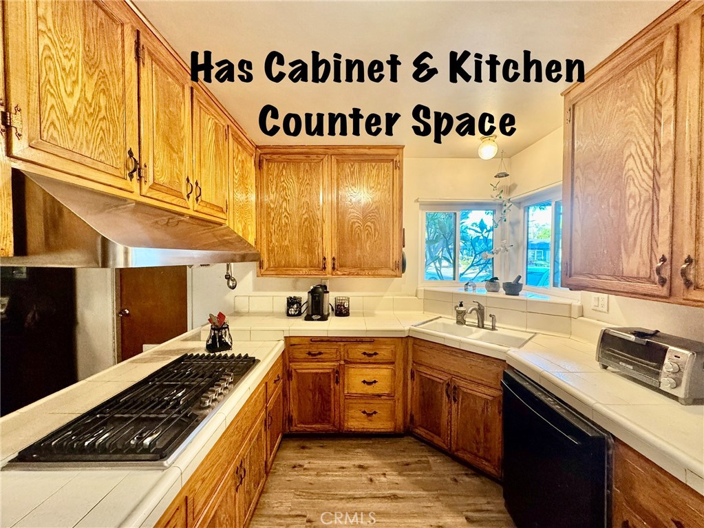 211 Benicia Road Diamond Bar, CA 91765 - Photo 11 of 36 CABINET AND COUNTER SPACE IN KITCHEN.