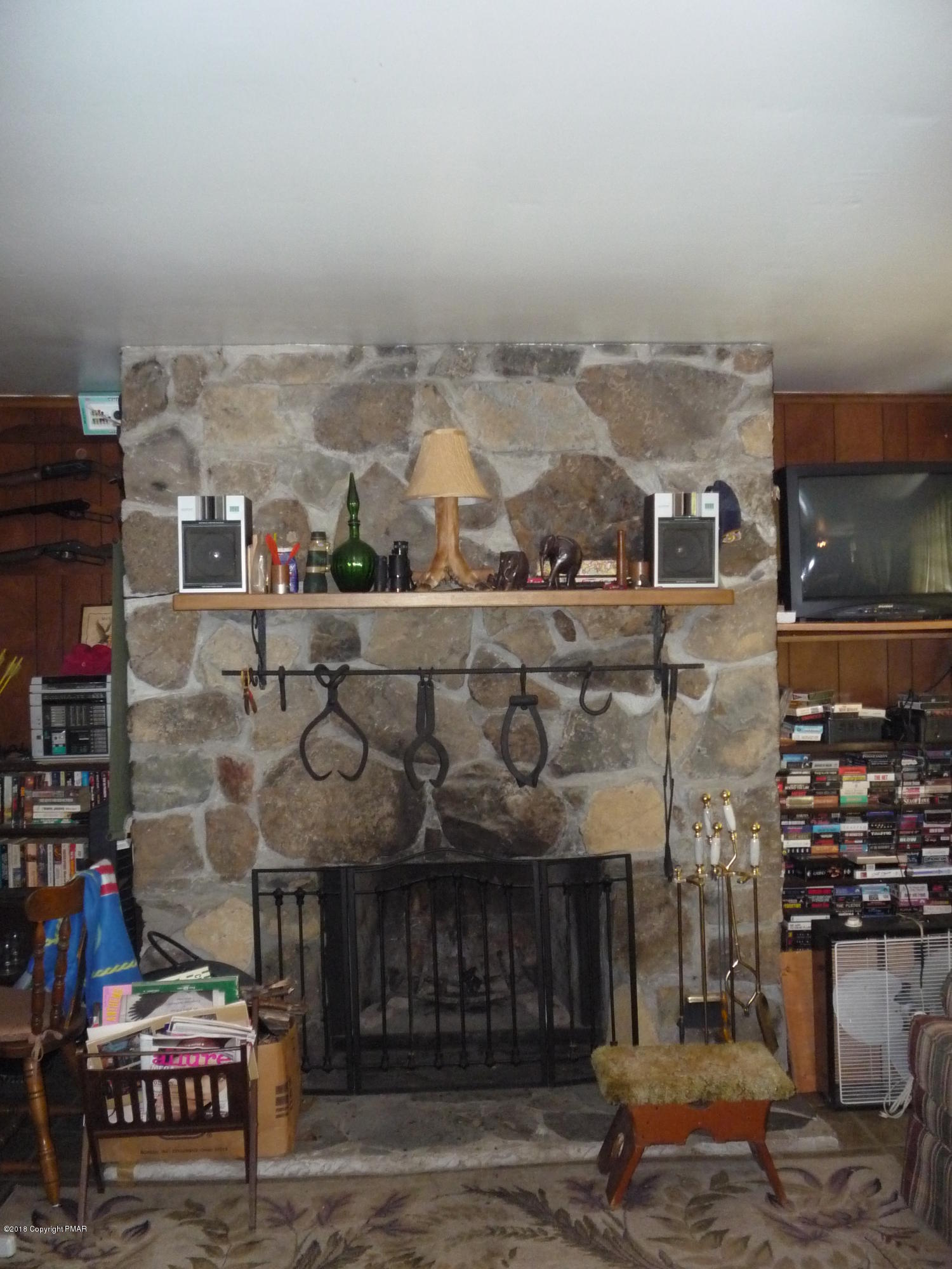 696 Chickadee Lane Bushkill, PA 18324 - Photo 13 of 25 Stone faced fireplace