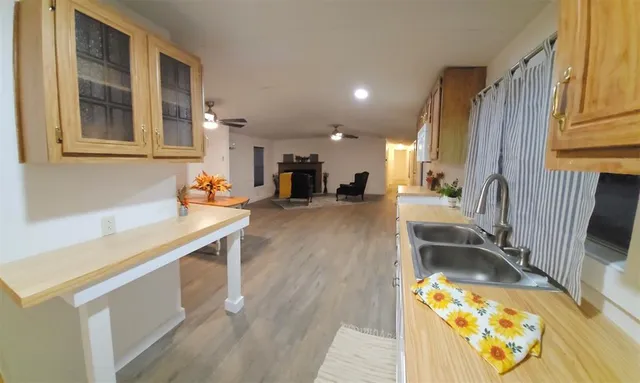 a view of living room with furniture and natural light