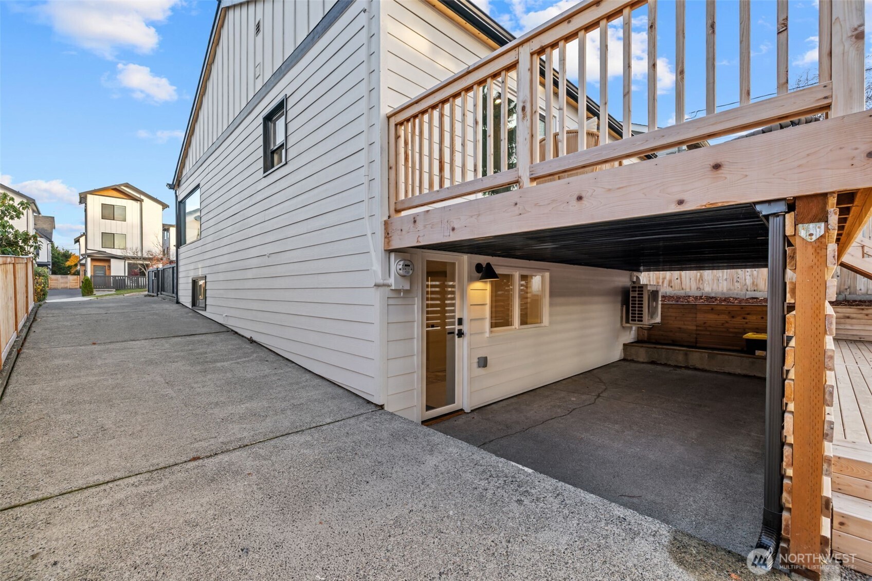 4725 37th Avenue Southwest Seattle, WA 98126 - Photo 24 of 37 a view of a house with a balcony