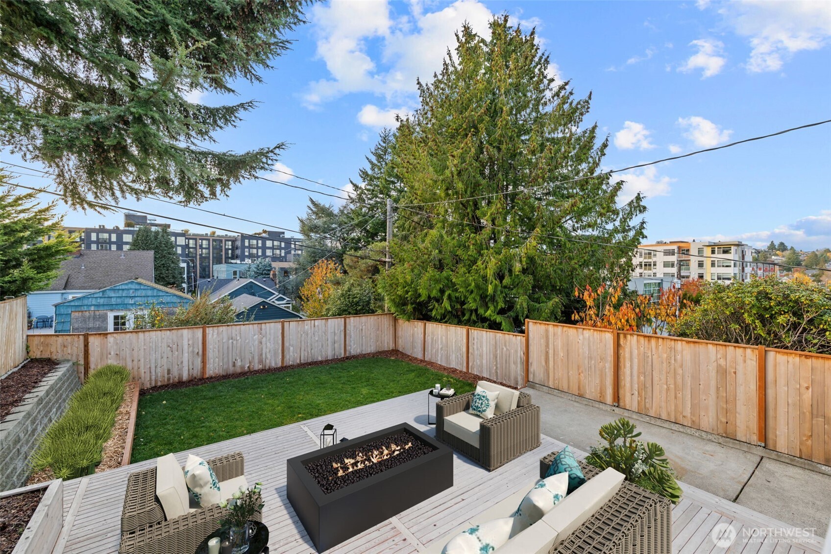 4725 37th Avenue Southwest Seattle, WA 98126 - Photo 29 of 37 a view of backyard with seating and green space