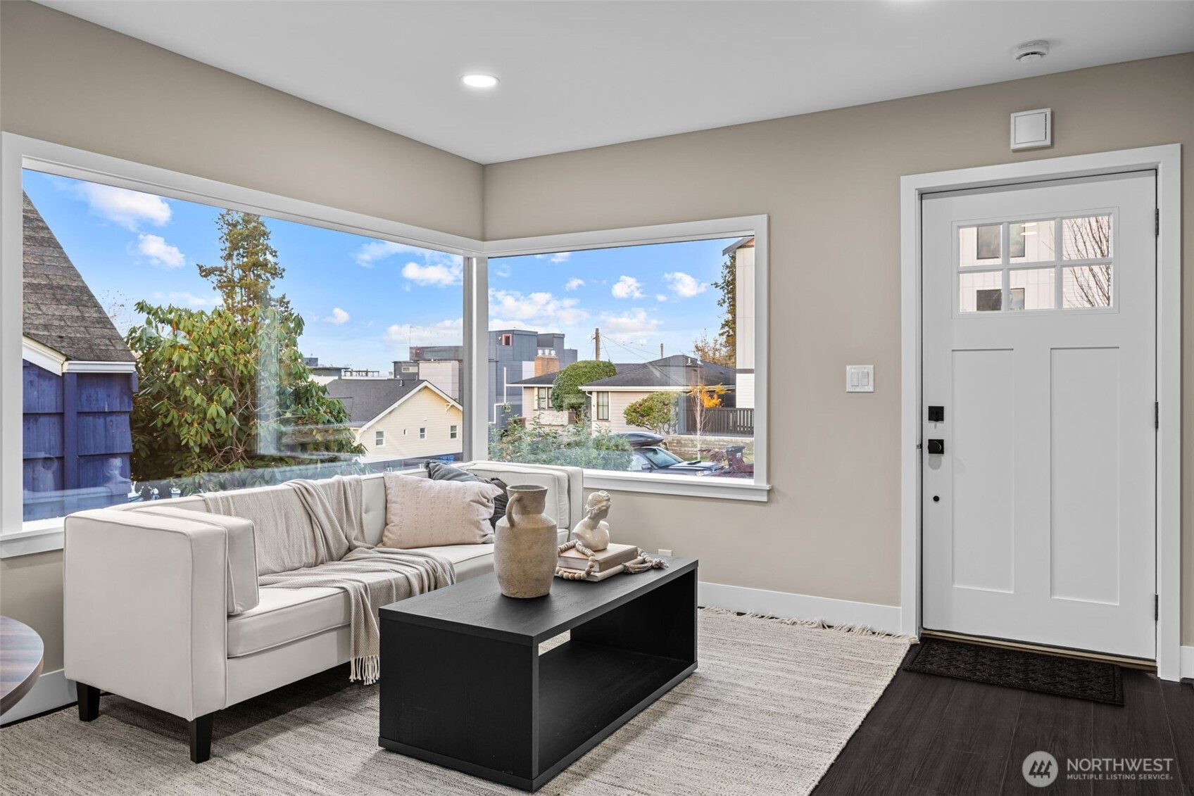 4725 37th Avenue Southwest Seattle, WA 98126 - Photo 3 of 37 a living room with furniture and a large window