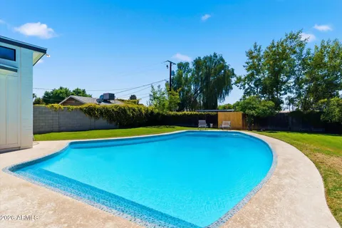 a backyard of a house with lots of green space