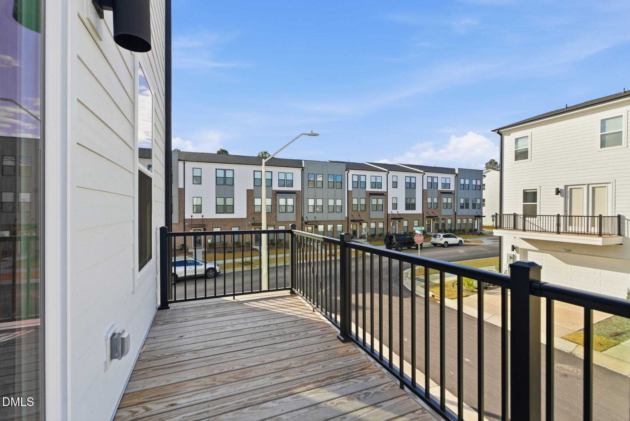 501 Hedrick Ridge Road Cary, NC 27519 - Photo 21 of 47 a view of a balcony with wooden floor