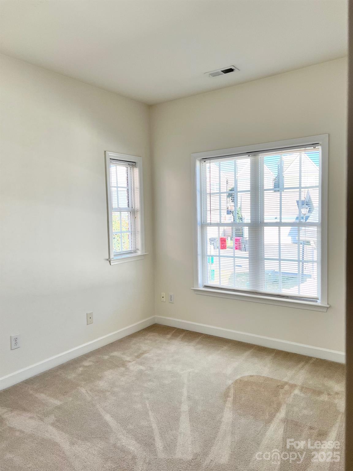 630 Old Meeting Way Davidson, NC 28036 - Photo 13 of 19 an empty room with a window