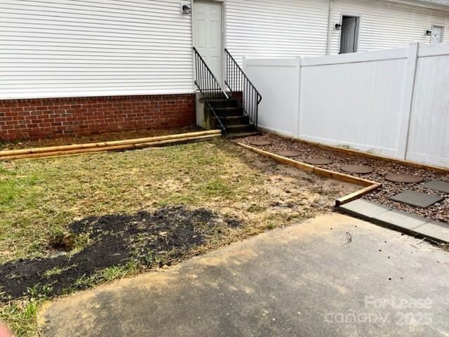 630 Old Meeting Way Davidson, NC 28036 - Photo 17 of 19 a view of a house with backyard