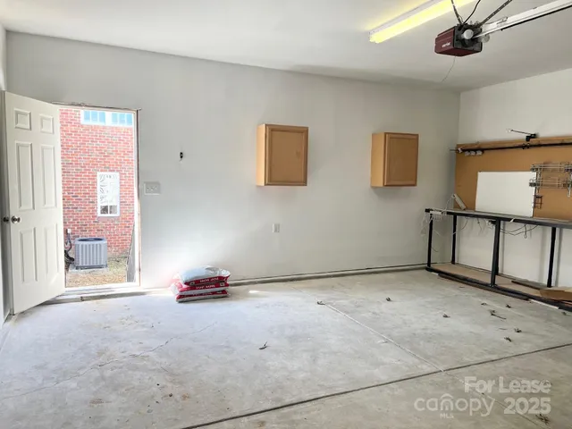 a view of a livingroom with furniture and a ceiling fan