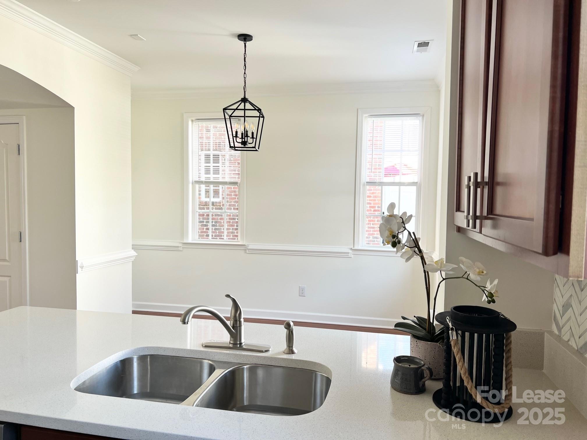 630 Old Meeting Way Davidson, NC 28036 - Photo 9 of 19 a kitchen with a sink and a window