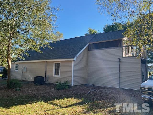 2268 Sanders Road Willow Spring, NC 27592 - Photo 3 of 11 a view of a house with a yard