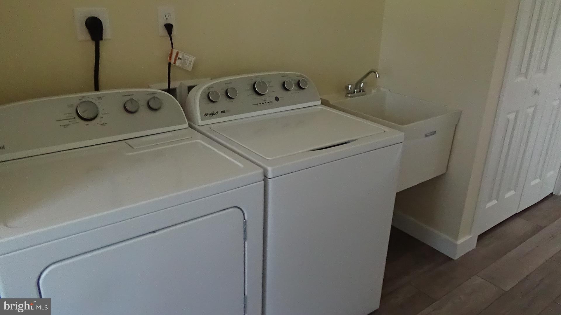 130 Soule Road New Bloomfield, PA 17068 - Photo 8 of 18 a utility room with dryer and washer
