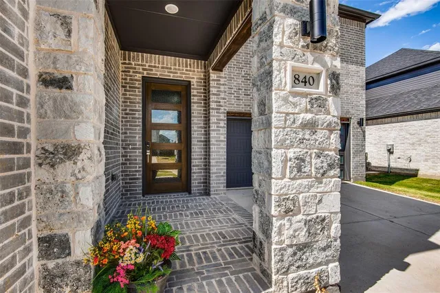 a front view of a house with a porch