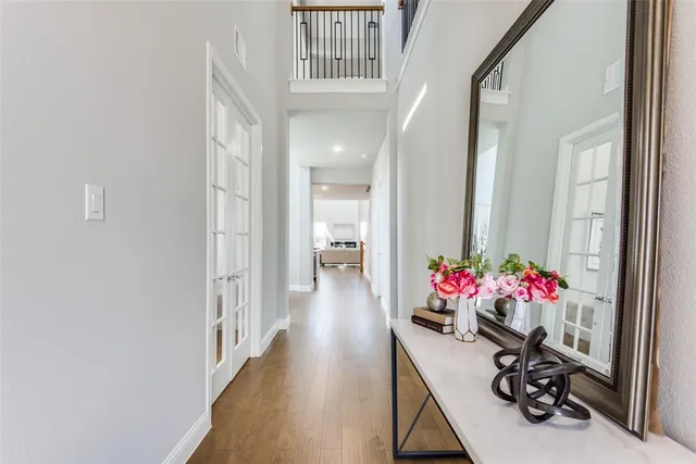 a view of a hallway and a flower pot