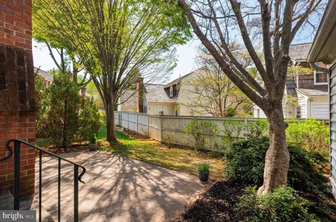 a view of backyard of a house