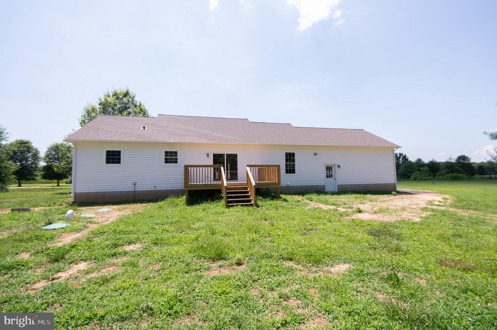 6706 Jayar Way Hurlock, MD 21643 - Photo 18 of 19 a house view with a garden space