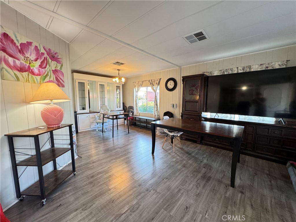 9800 Base Line Road, Unit 76 Rancho Cucamonga, CA 91701 - Photo 7 of 20 a living room with furniture and a flat screen tv