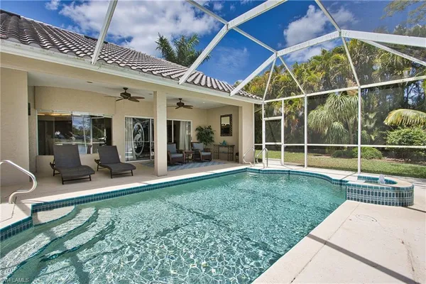 a view of a backyard with porch area