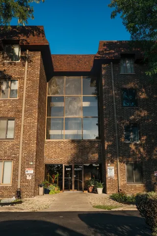a view of a building with a street