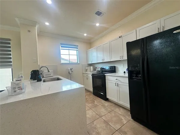 a bathroom with a double vanity sink mirror and double