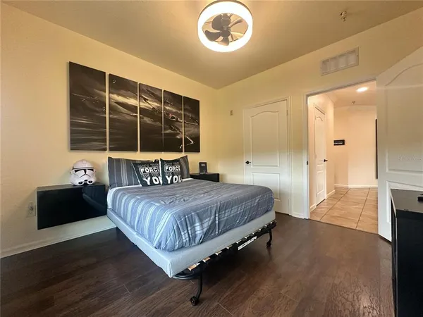 a bathroom with a toilet and a bathtub