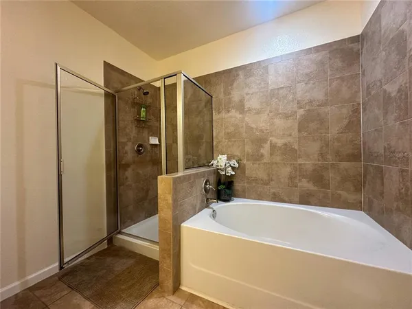 a white bath tub sitting in a bathroom