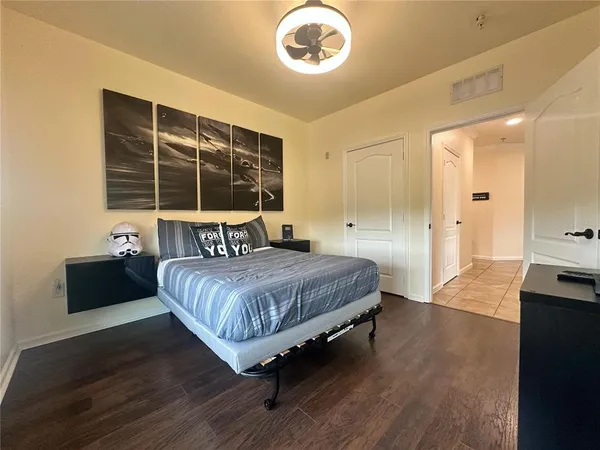 a bathroom with a toilet a sink and shower