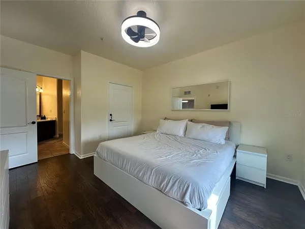 a view of a swimming pool with front of house