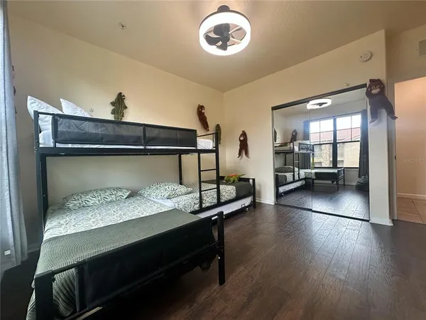a roof deck with dining table and chairs