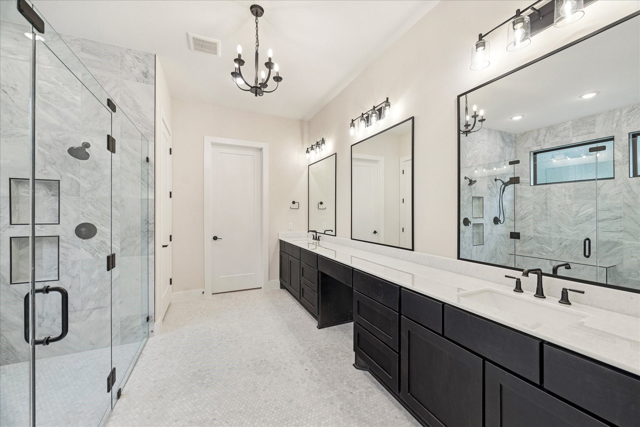 104 Dawn Court Huntsville, TX 77340 - Photo 18 of 37 a spacious bathroom with a double vanity sink mirror and shower