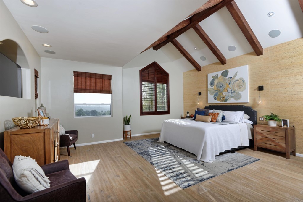 1264 Rancho Encinitas Drive Encinitas, CA 92024 - Photo 16 of 37 a bedroom with furniture and a window
