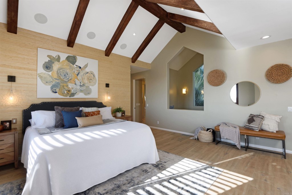 1264 Rancho Encinitas Drive Encinitas, CA 92024 - Photo 17 of 37 a bedroom with a large bed and a window