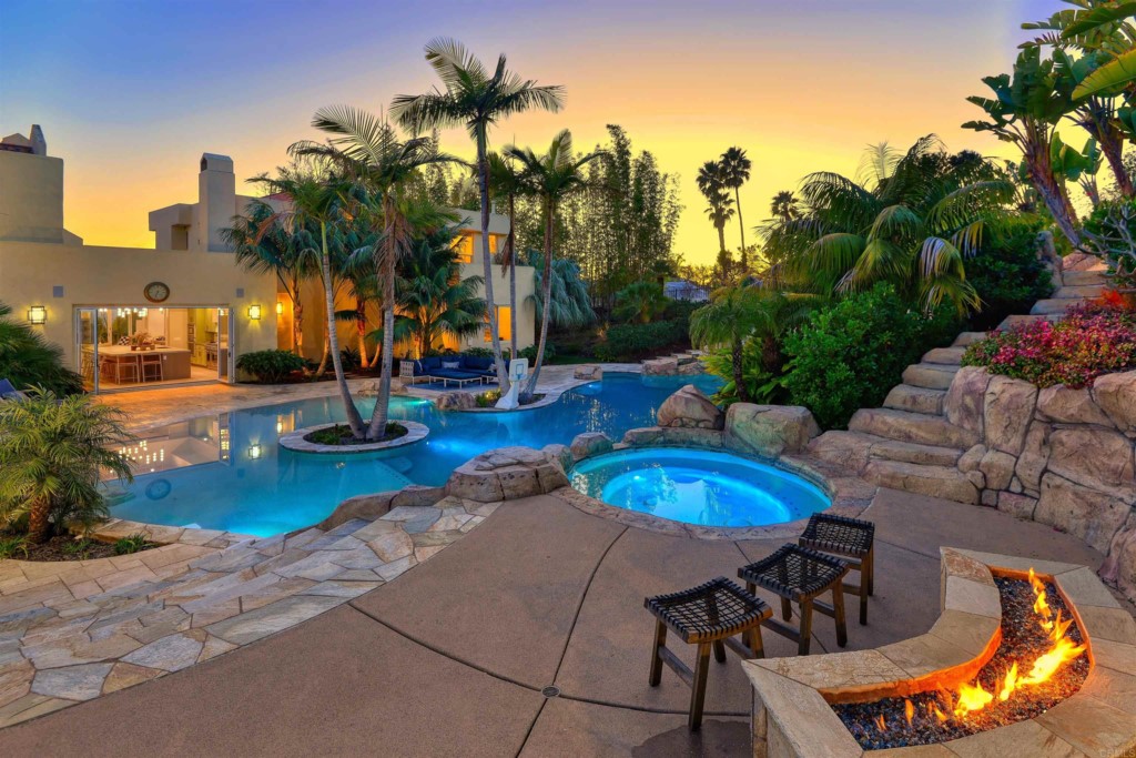 1264 Rancho Encinitas Drive Encinitas, CA 92024 - Photo 19 of 37 a view of a swimming pool with a patio and fire pit