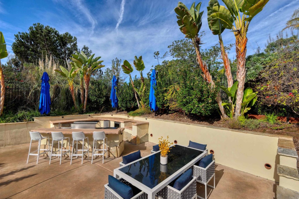 1264 Rancho Encinitas Drive Encinitas, CA 92024 - Photo 32 of 37 a view of a patio with swimming pool