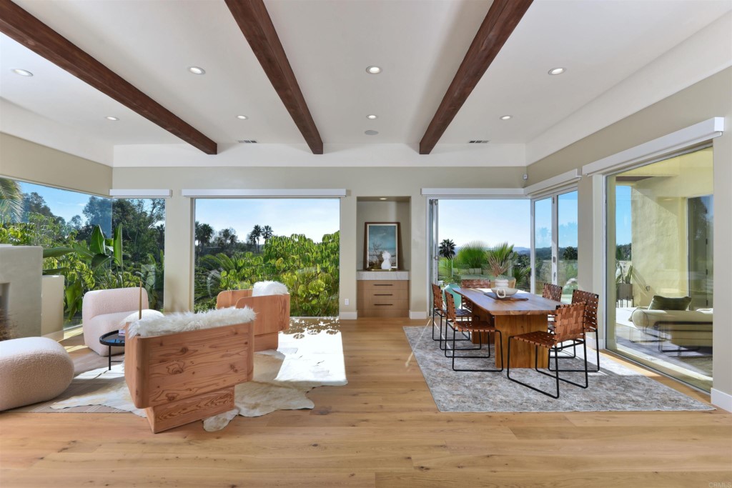 1264 Rancho Encinitas Drive Encinitas, CA 92024 - Photo 7 of 37 a living room with furniture and a large window