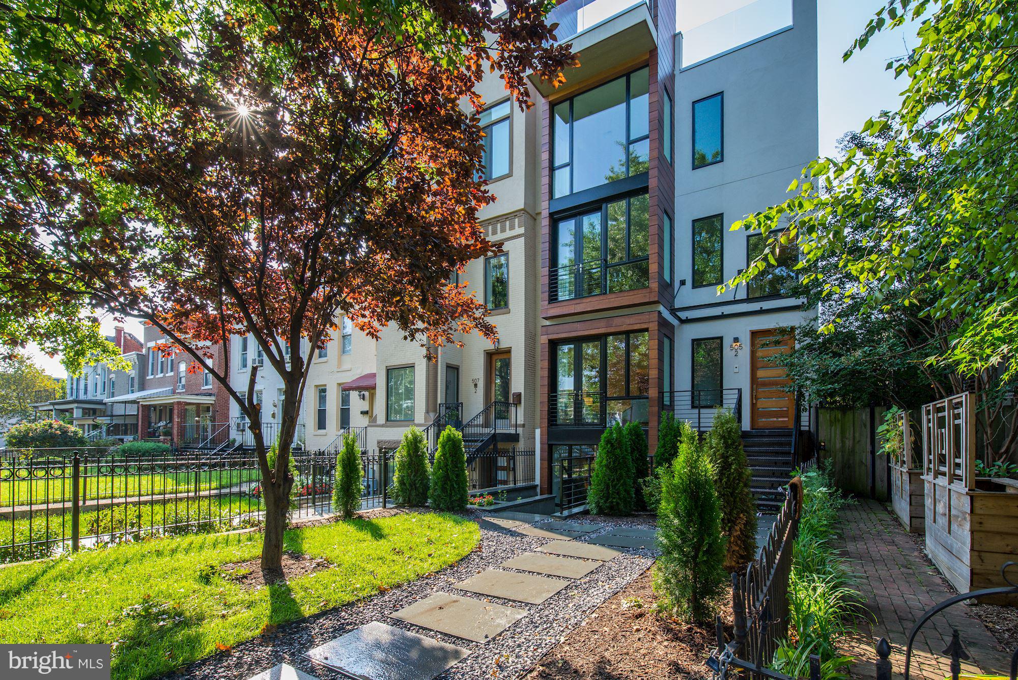 a view of a building with a garden