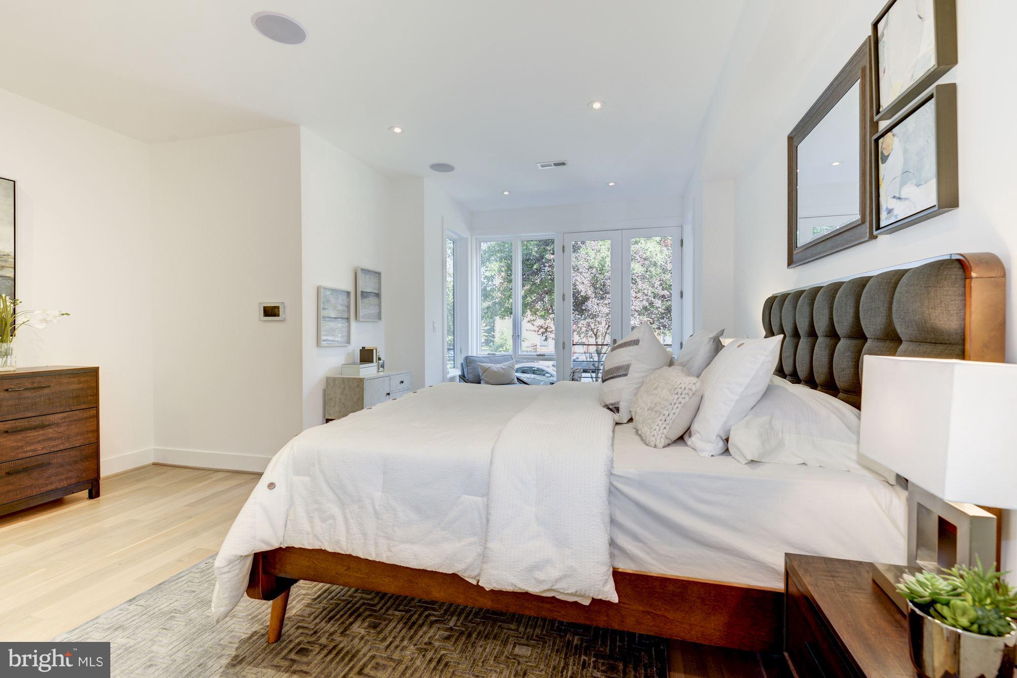 505 K Street Northeast, Unit 2 Washington, DC 20002 - Photo 14 of 18 a bedroom with a large bed and a window