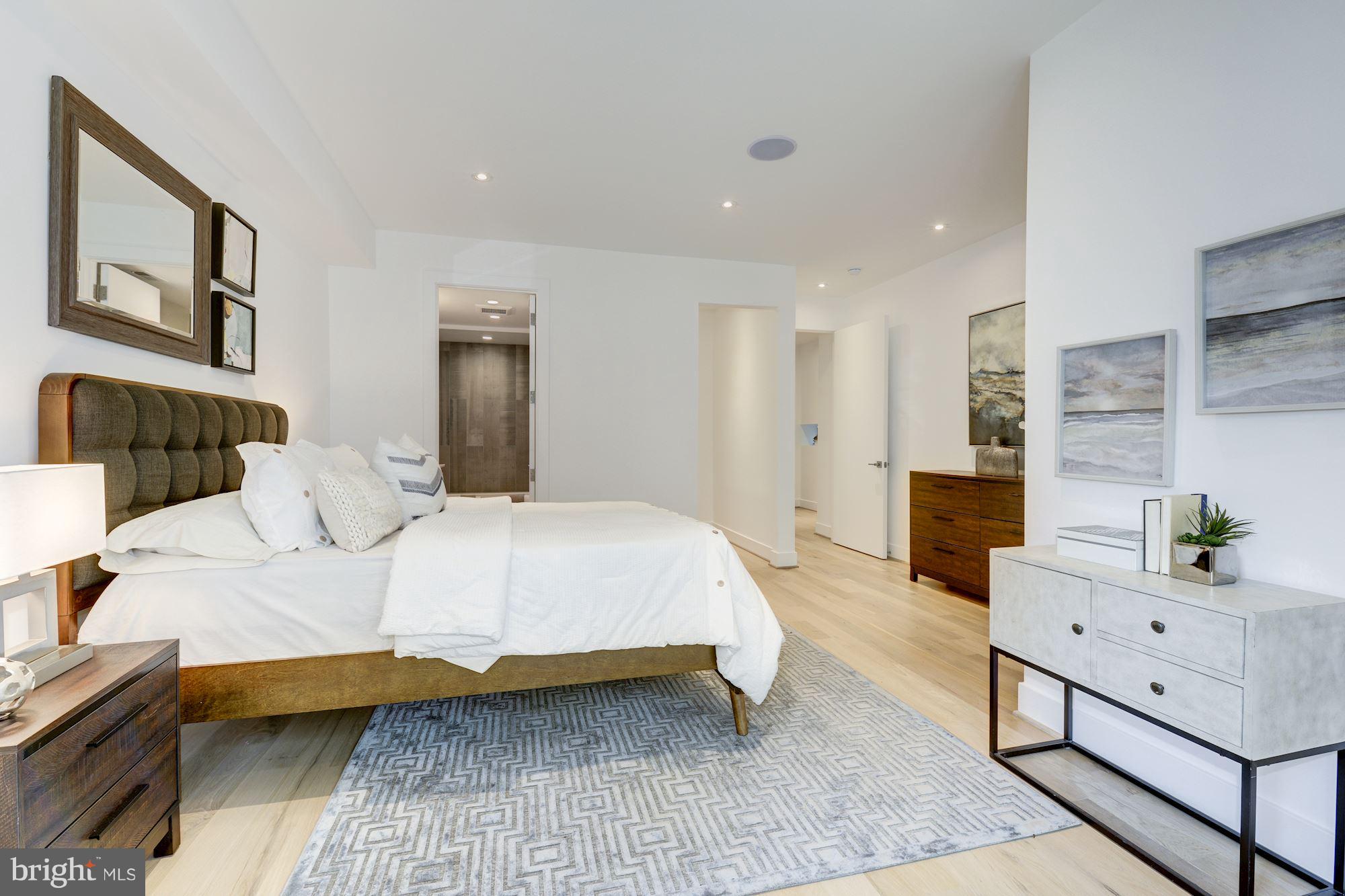 505 K Street Northeast, Unit 2 Washington, DC 20002 - Photo 15 of 18 a bedroom with a bed and a dresser