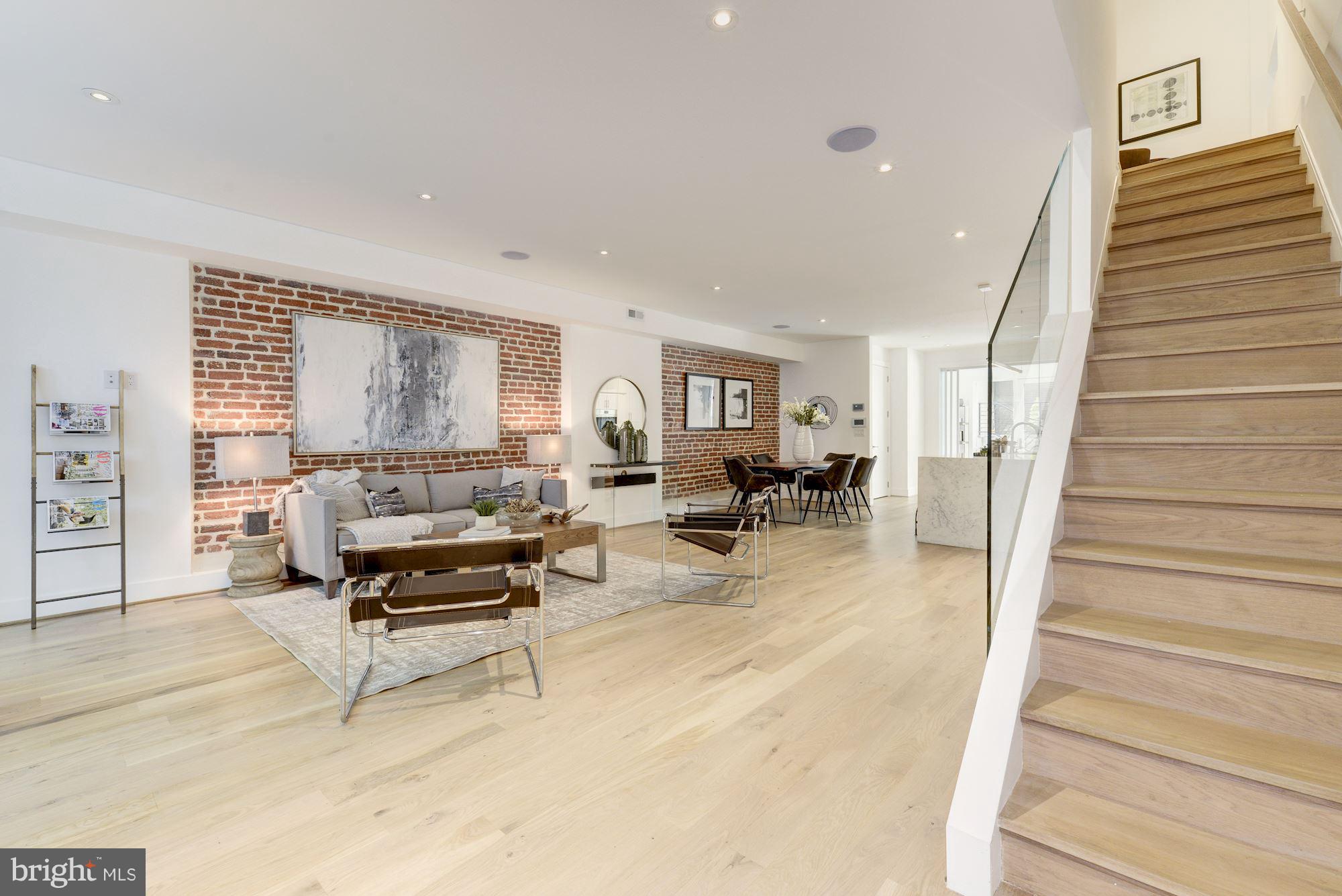 505 K Street Northeast, Unit 2 Washington, DC 20002 - Photo 3 of 18 a living room with furniture and a wooden floor