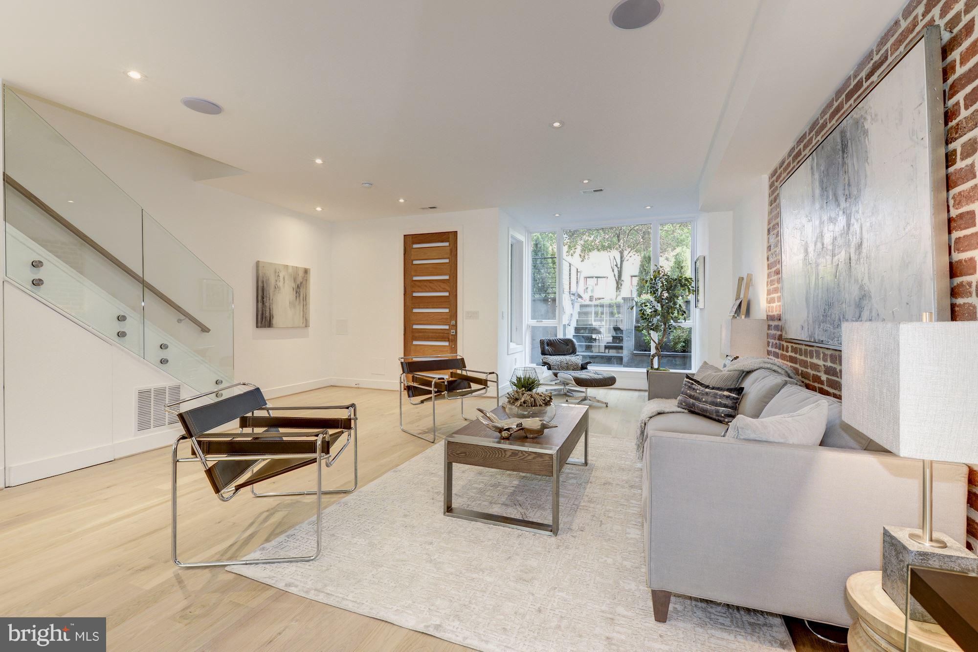 505 K Street Northeast, Unit 2 Washington, DC 20002 - Photo 4 of 18 a living room with furniture and a window