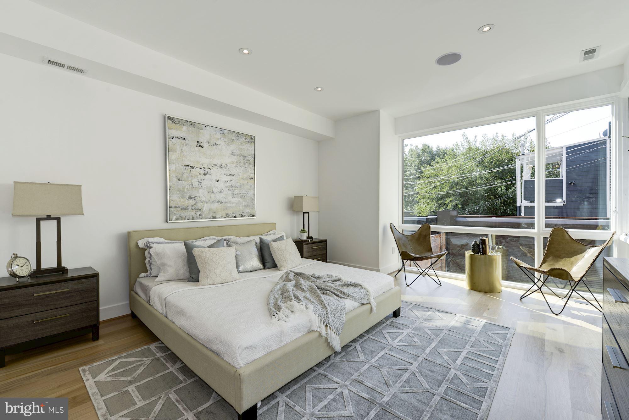 505 K Street Northeast, Unit 2 Washington, DC 20002 - Photo 10 of 18 a living room with furniture and a large window