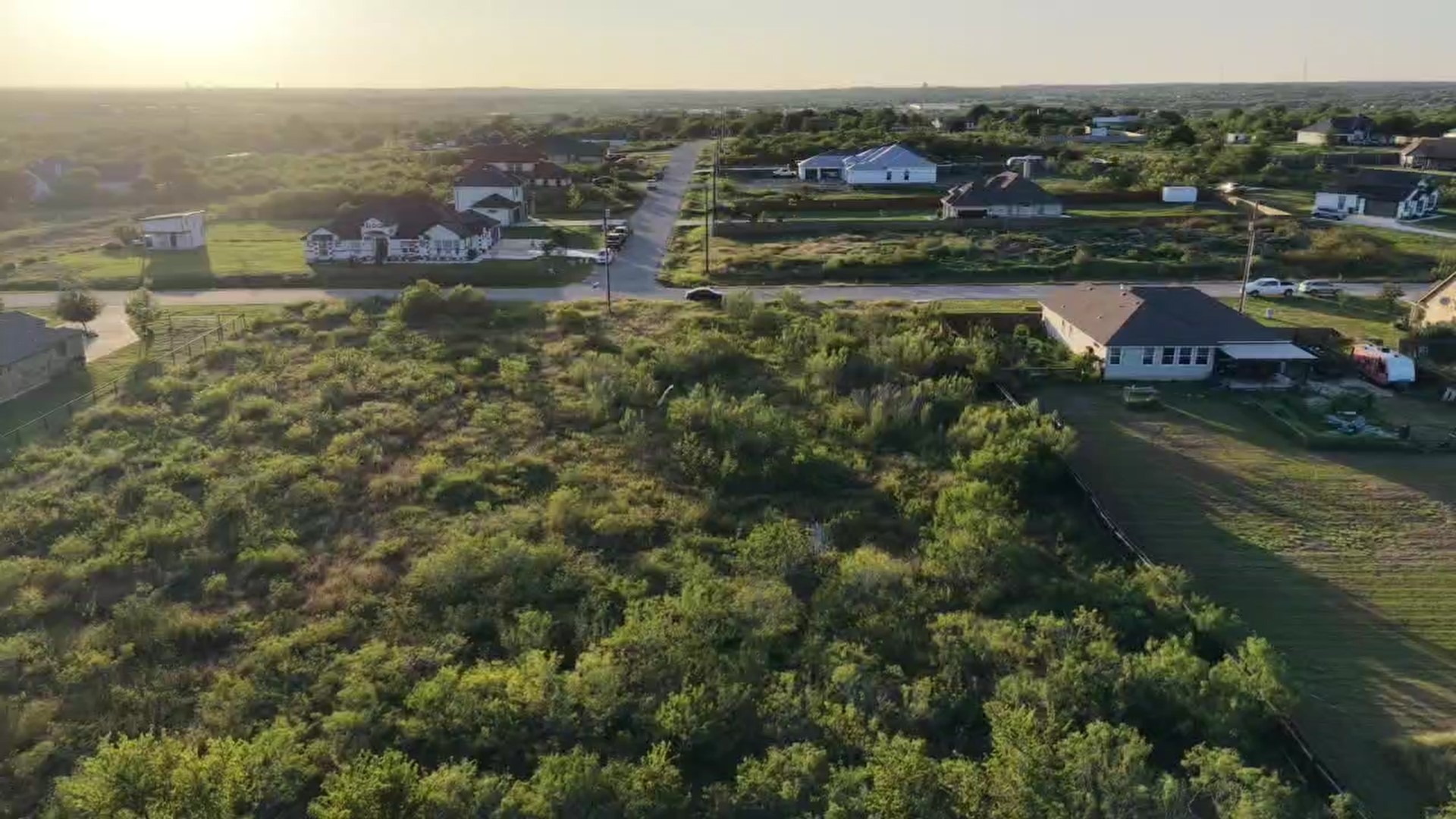 232 East Ridge Lane Kyle, TX 78640 - Photo 14 of 36 A spacious, undeveloped lot awaits your vision in a growing residential area.