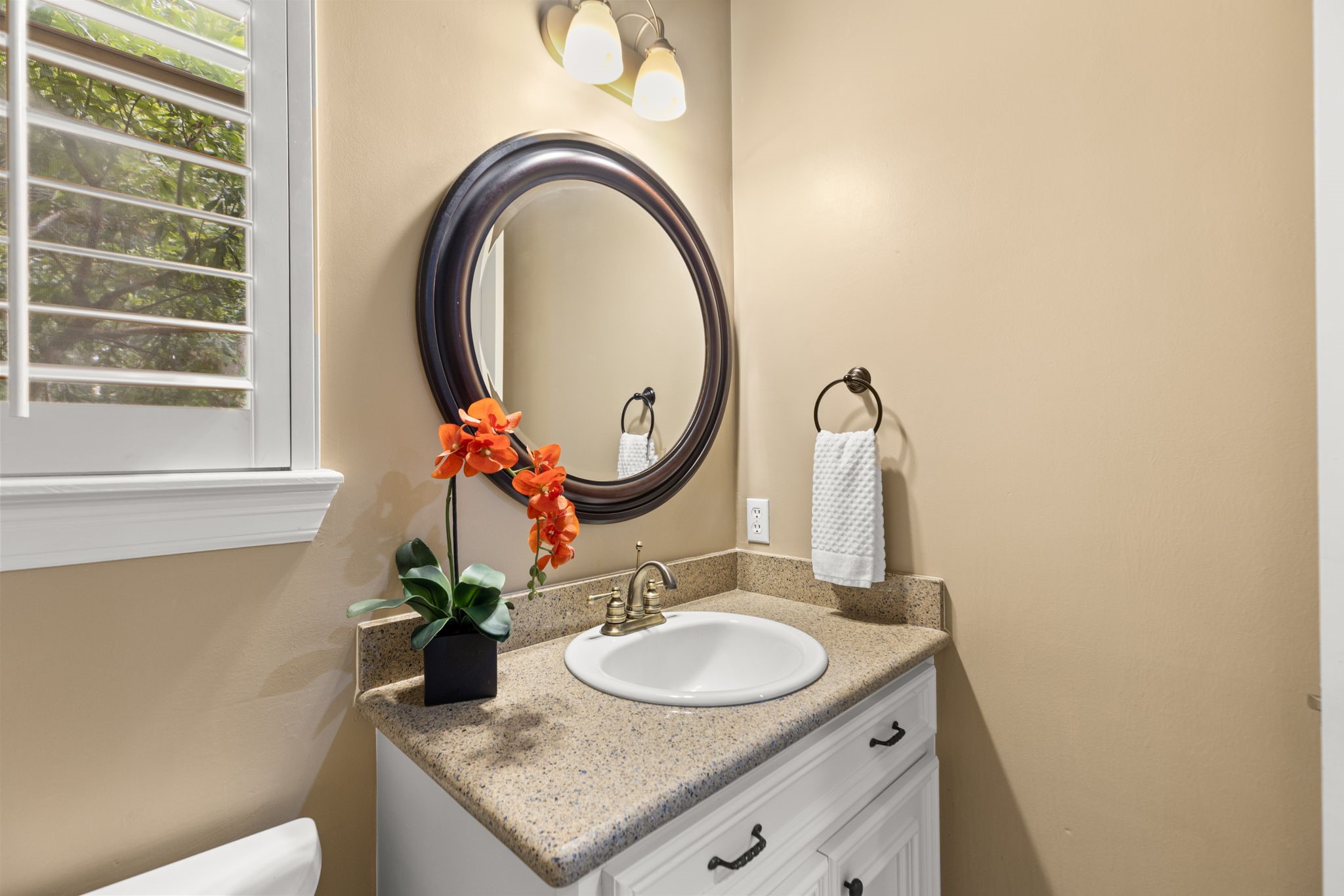 6610 Radley Drive Spring, TX 77379 - Photo 19 of 50 Half bath off Family room. Granite counter top and additional built-in linen closet.