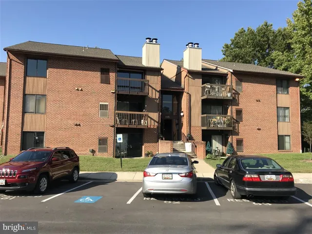 a car parked in front of a house