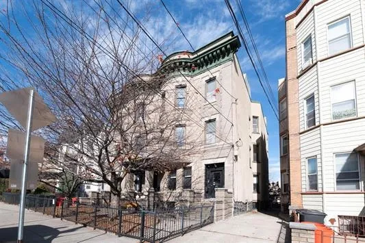 a view of entryway with brick walls