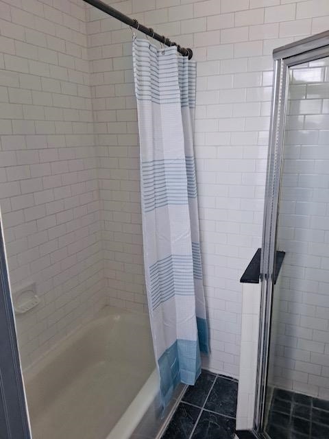 312 Monastery Place, Unit 2R Union City, NJ 07087 - Photo 11 of 15 a bathroom with a shower