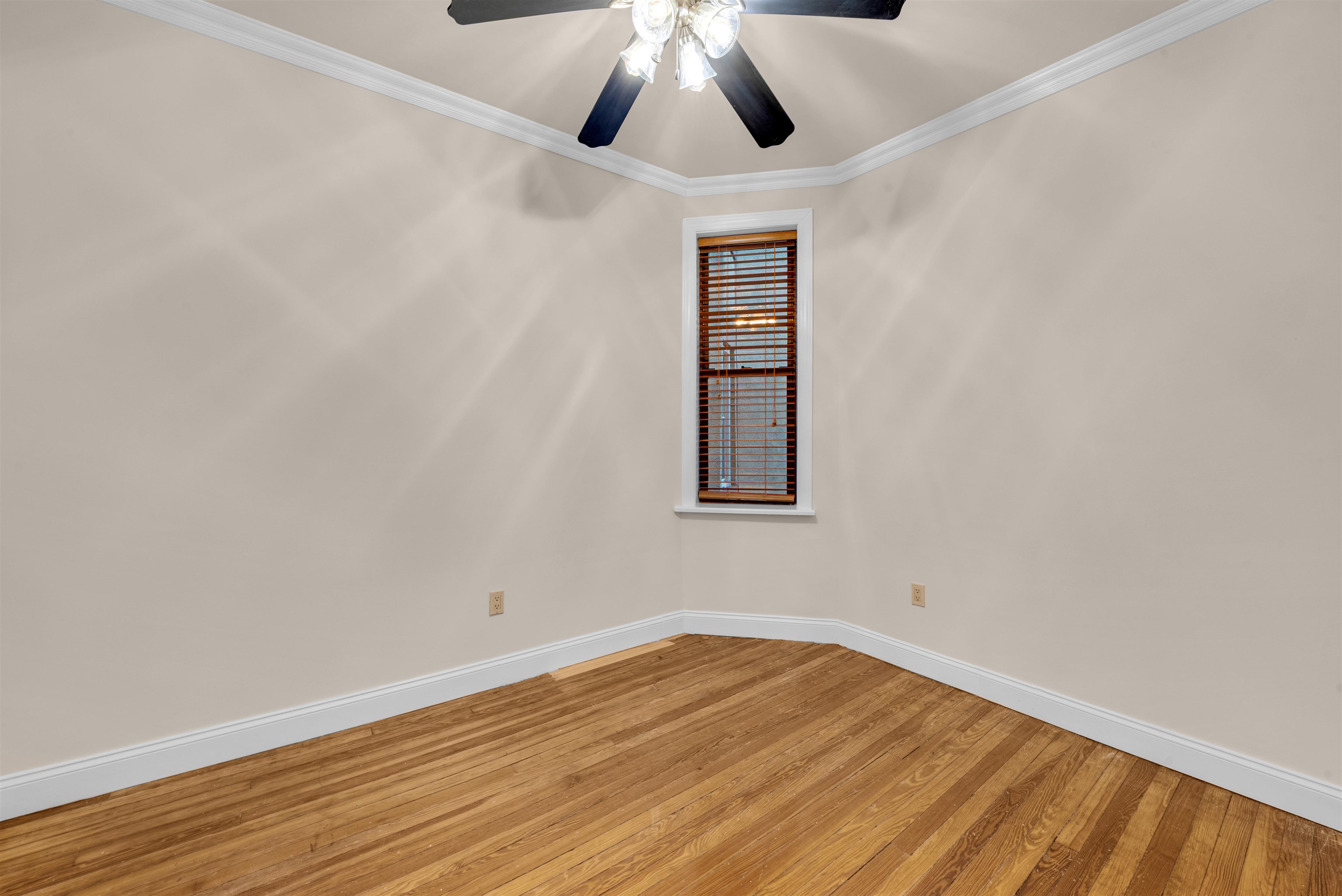 312 Monastery Place, Unit 2R Union City, NJ 07087 - Photo 9 of 15 a view of empty room with wooden floor